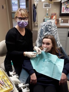 child getting a fluoride treatment in Quakertown, PA Dental office