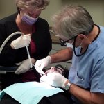 Dr Kiesel performing a dental procedure